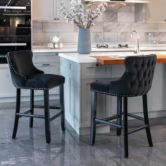 GAKMCIL Velvet Upholstered Wing-Back Barstools, Counter Height Solid Wood Bar Chairs with Button Tufted, Chrome Nailhead Trim, Wooden Legs, 300lb Load for Kitchen, Dining Room, Pub (Set of 2, Black)